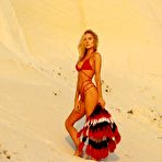 First pic of Kimberley Garner in red bikini in desert