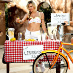 Fourth pic of Busty blonde Natasha Starr stops to visit topples teen Natalia Starr at her lemonade stand.