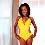 First pic of Horny ebony doll Lauren Lesley in the yellow swimsuit and absolutely nude