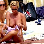 Third pic of Federica Mancini sunbathing topless on a beach