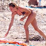 Fourth pic of Sienna Miller in bikini on the beach