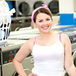 First pic of Short teen Cali Hayes plays with herself at the laundromat when the owner comes by and helps her out