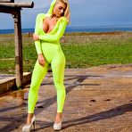 First pic of Busty Blonde in a Green Bodysuit