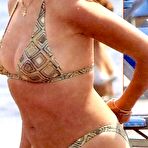 Third pic of Claudia Gerini topless and titslip paparazzi shots