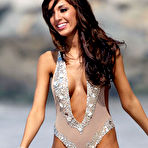 Fourth pic of Farrah Abraham side of boob & cleavage on a beach