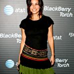 Fourth pic of Gina Gershon posing for paparazzi Blackberry Torch launch party