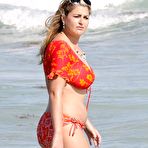 First pic of Busty Josie Goldberg shows side of boob on the beach in Miami