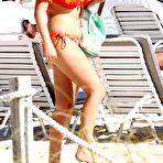 Fourth pic of Busty Josie Goldberg shows side of boob on the beach in Miami