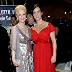 Fourth pic of Katarina Witt shows cleavage in long red dress