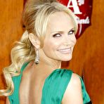 Third pic of Kristin Chenoweth shows legs and cleavage