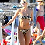 First pic of Lena Gercke exposed her long legs on the beach in St Tropez