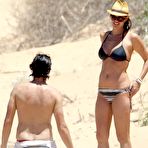 Second pic of Megan Gale in bikini and topless on the beach