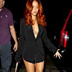 First pic of Rihanna without bra under jacket