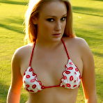 Second pic of Kristine rocking some bikinis at the park.