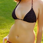 Third pic of Kristine rocking some bikinis at the park.