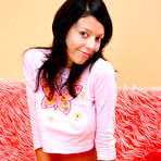 Third pic of FilthyNubiles.com's gallery :: cute charming hottie teasing and posing attractively on sofa