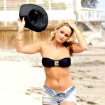 Third pic of Sam Faiers in bikini top and shorts on the beach
