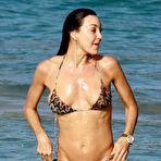 Third pic of Tamara Mellon in bikini and topless on a beach paparazzi shots