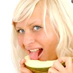 Second pic of FilthyNubiles.com's gallery :: look at this hottie she is blonde and cute and has big tits and oh yea she is eating a slice of melon