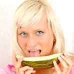 Third pic of FilthyNubiles.com's gallery :: look at this hottie she is blonde and cute and has big tits and oh yea she is eating a slice of melon