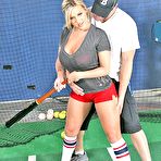 Second pic of porn star Memphis Monroe sticking his baseball bat between her big round softball sized tits!