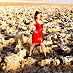 First pic of porn star Aria Giovanni posing in red latex in the desert sun!