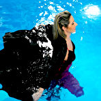 Third pic of Beautifully dressed stocking babes Hana Black and Daria Glower swim in the pool