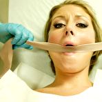Fourth pic of Busty milf Velicity Von gets her vagina explored and her clit tortured by speculum-equipped doctor