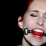 Third pic of Ball gagged Calico Slave gets her pierced nipples punished in device bondage.