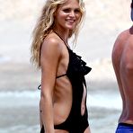 Second pic of Erin Heatherton sexy posing in black swimsuit in St Barth