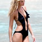 Fourth pic of Erin Heatherton sexy posing in black swimsuit in St Barth