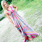 First pic of Incredible blonde Meet Madden goes out to the lake for a softcore striptease in her long dress.
