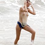 Second pic of Toni Garrn nude tits under see through wet top