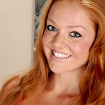 First pic of Cheerful redhead takes off her black panties to pose totally nude - IamXXX.com