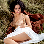 First pic of Curly-haired brunette shows her exotic nude body in the haystack - aMetart.com