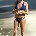 Second pic of Andrea Corr in blue bikini on a beach & yacht