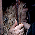 Fourth pic of SexPreviews - Rain DeGrey blonde is bound in metal for dipping and spanking in kinky dungeon