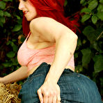 Second pic of [All Over 30] Horny redhead Andrea Rosu posing naked on a hay bail - IWantMature.com