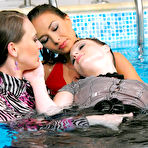 Fourth pic of Lucy Cornet and Hana Black swim in the pool with their dresses and nylons on