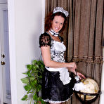 First pic of [All Over 30] Roxanne Clemmens is a sexy French maid as she slips out of her uniform - IWantMature.com