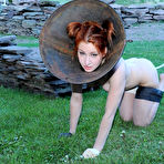 Second pic of SexPreviews - Calico Slave redhead is metal bound in dungeon toy fucked to orgasms
