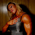 First pic of Blonde bodybuilder Colette Nelson in dress and nylons shows of her heavy muscles