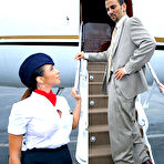 First pic of Aimee Addison and another sexy dressed stewardess share a hard meaty cock
