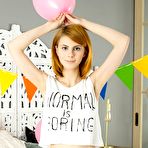 First pic of This astonishing redhead girl really loves playing with herself after getting fully naked on her bed. gallery