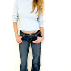 First pic of Estella Warren in jeans and blue sweater