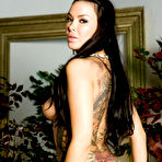 Fourth pic of Sophia Santi: Hottie caresses tattooed body @ Penthouse - XNSFW.COM