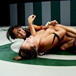Second pic of Defeated big boobed wrestler Trina Michaels gets bent over and fucked by asian opponent Tia Ling