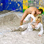 Fourth pic of Filly nude man fucks fully clothed european blonde Laura Crystal in the mud