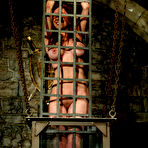 First pic of Sasha Monet is helpless in cage when Chanta Rose dunks her in vertical water tank