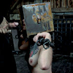 Fourth pic of SexPreviews - Juliette Black tattoo brunette with head in a box is bound gagged with deepthroat